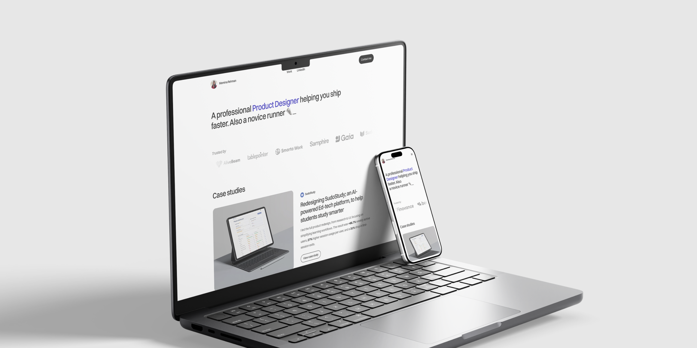 Portfolio website shown on laptop and phone mockups